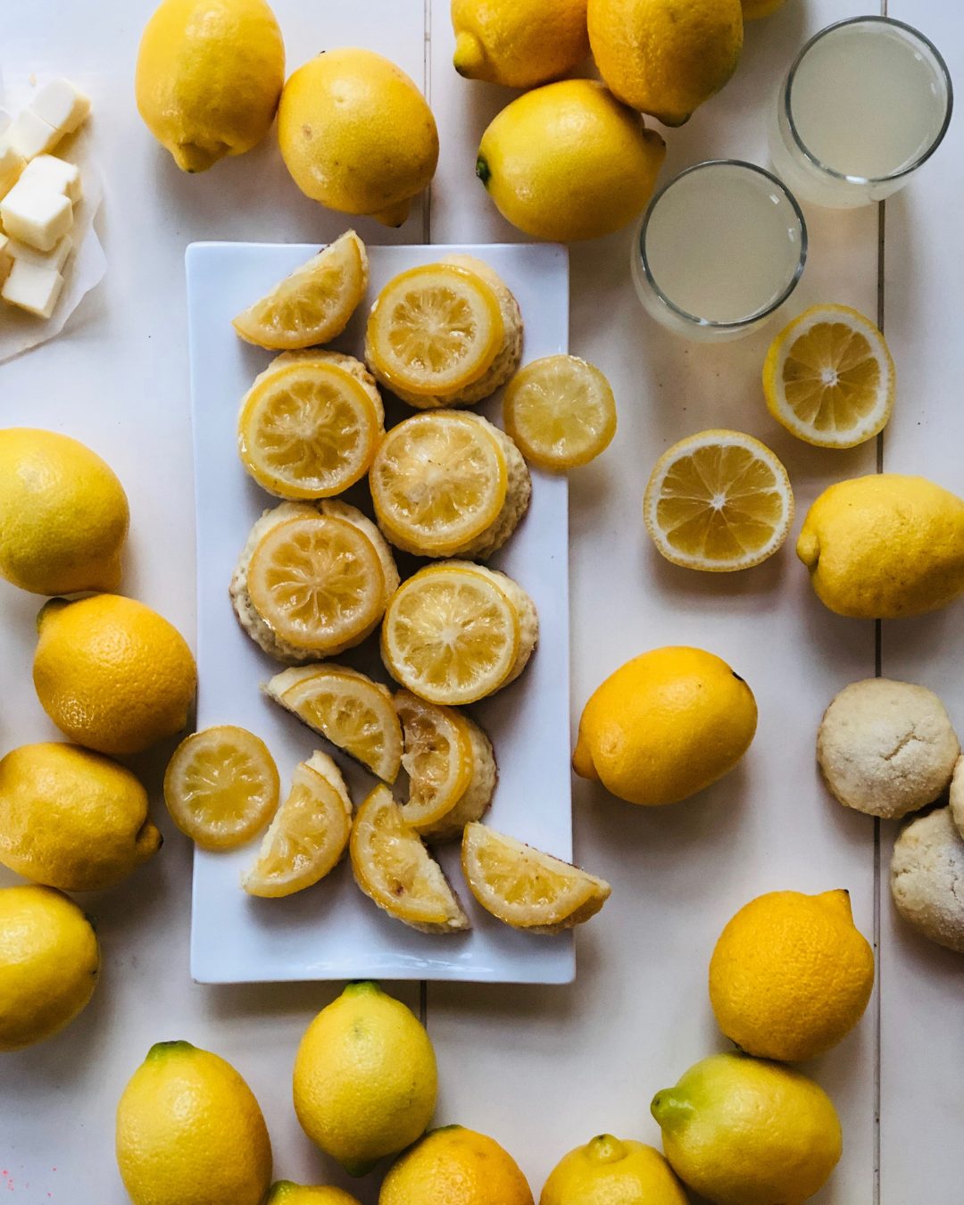 Lemon scones from overhead, surrounded by lemons